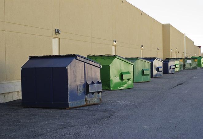 an assortment of sturdy and reliable waste containers near a construction area in Gillette, WY